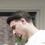 Donny, barber en eigenaar van Brasco Barbershop in Burgum